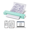 Mint green Phomemo M08F tattoo printer printing stencil paper, shown with mobile phone and laptop design sources