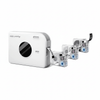 White Phomemo A30 portable label maker positioned next to assorted clear label tapes with different core colors.