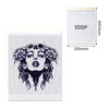 100-sheet tattoo transfer paper pack in A4 size with sample stencil print.